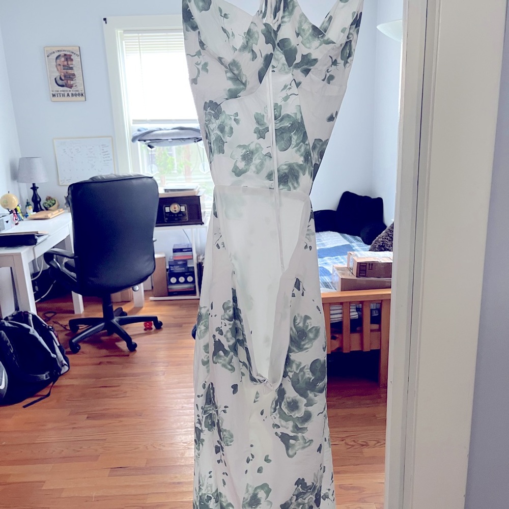 Hello Molly white and green dress with open back/side concept and thin straps.